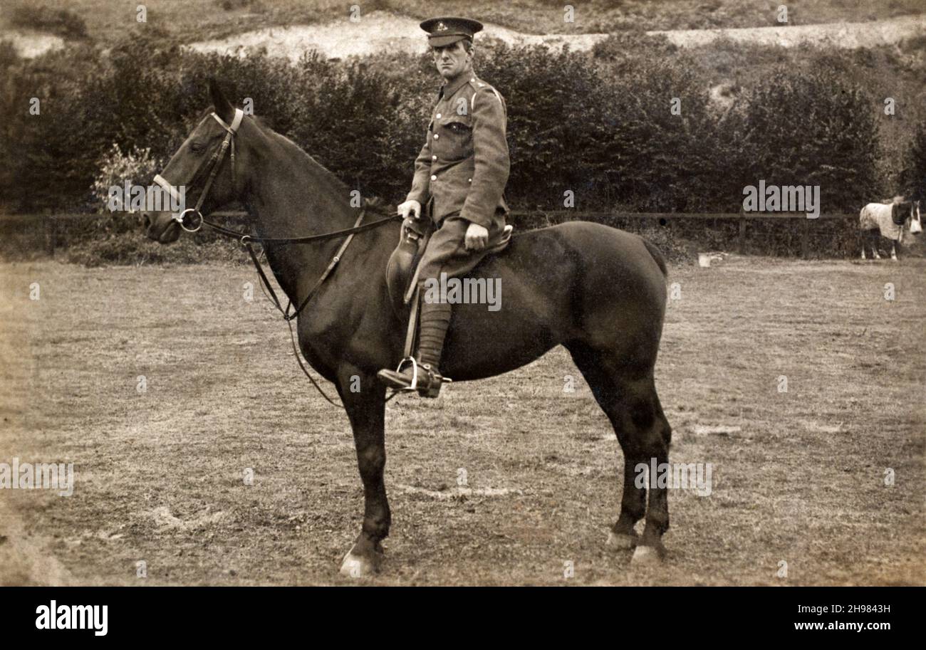 A First World War era portrait of a British army soldier, a Private in the Lancashire Fusiliers, mounted on a horse. Stock Photo