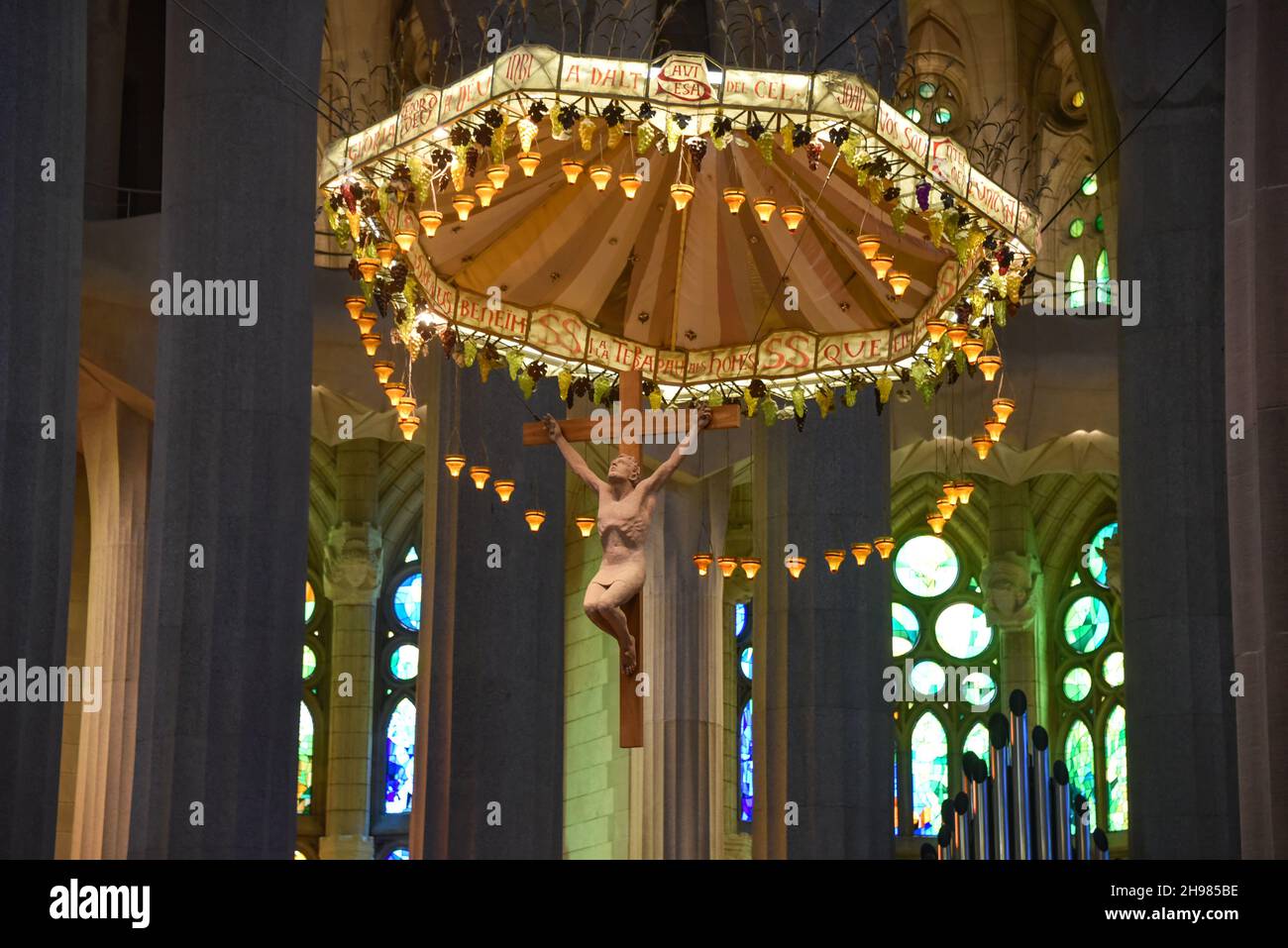 Barcelona, Spain - 22 Nov, 2021: Altar with sculpture of Jesus on cross, Sagrada Familia interior, Barcelona, Catalonia, Spain Stock Photo