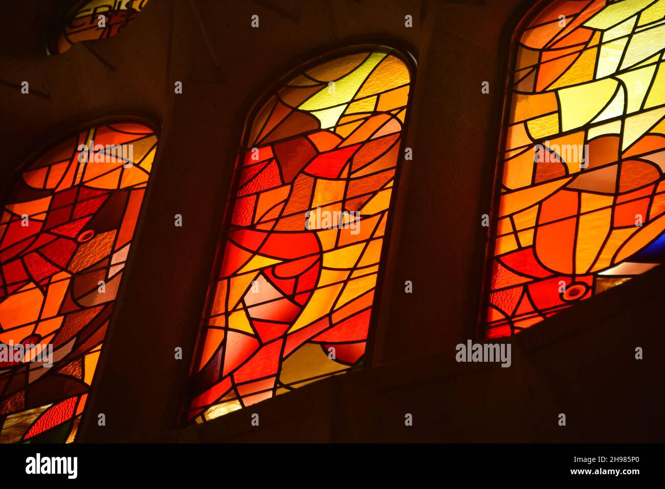 Barcelona, Spain - 22 Nov, 2021: Stained glass windows of the Basilica Sagrada Familia, Barcelona, Catalonia, Spain Barcelona, Spain - 22 Nov, 2021: S Stock Photo
