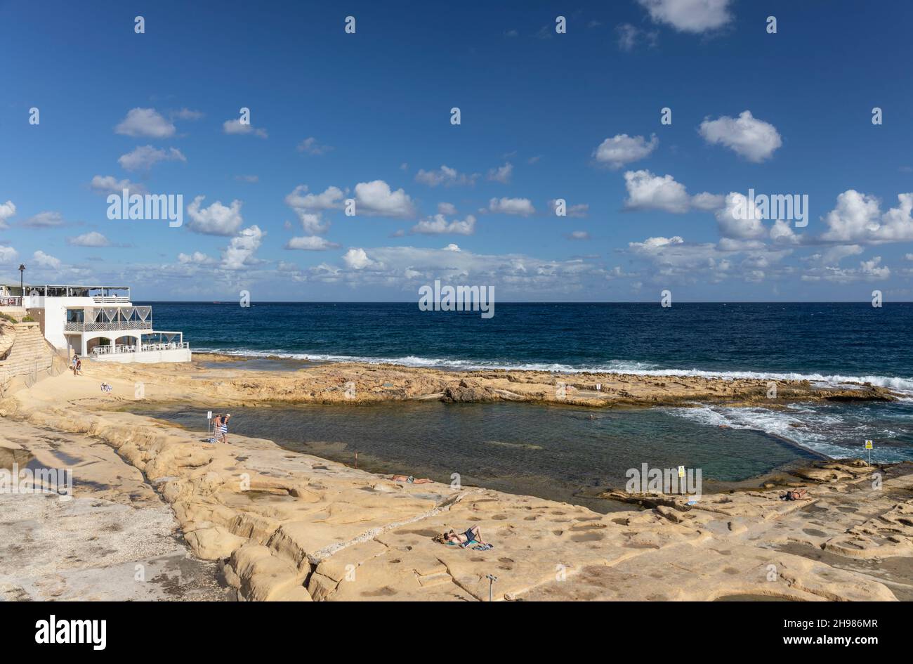 Fond Għadir lake and picturesque rocky beach, Sliema, Malta, Europe Stock Photo