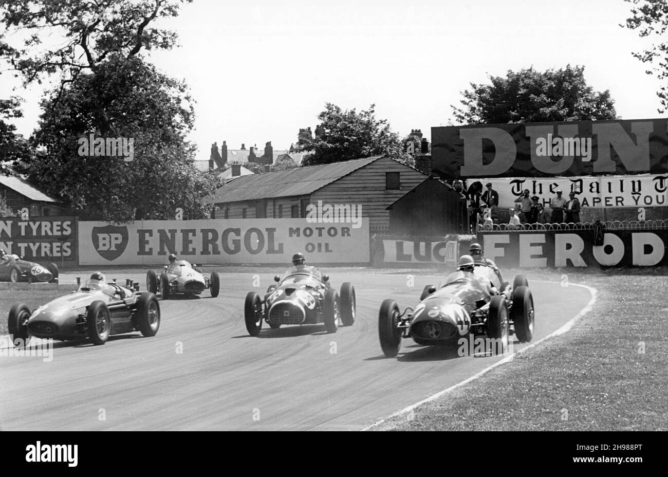 British Grand Prix, Aintree, Merseyside, 1955. Tony Rolt in a Connaught (36), and the Maserati of Roy Salvadori (44). Neither car finished the race. Stock Photo