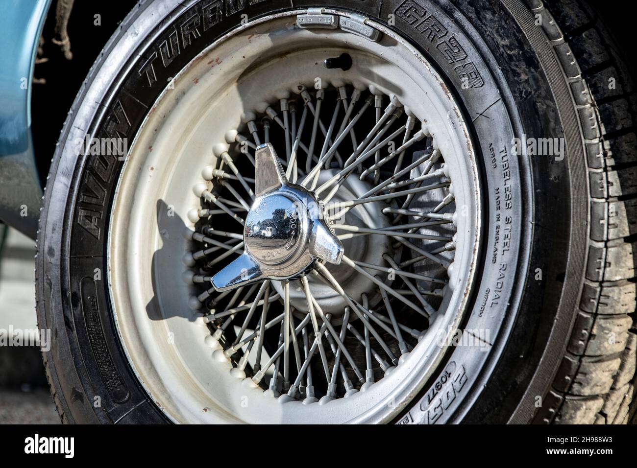 Spoked wheel of a 1961 Aston Martin DB4 GT SWB lightweight. Stock Photo