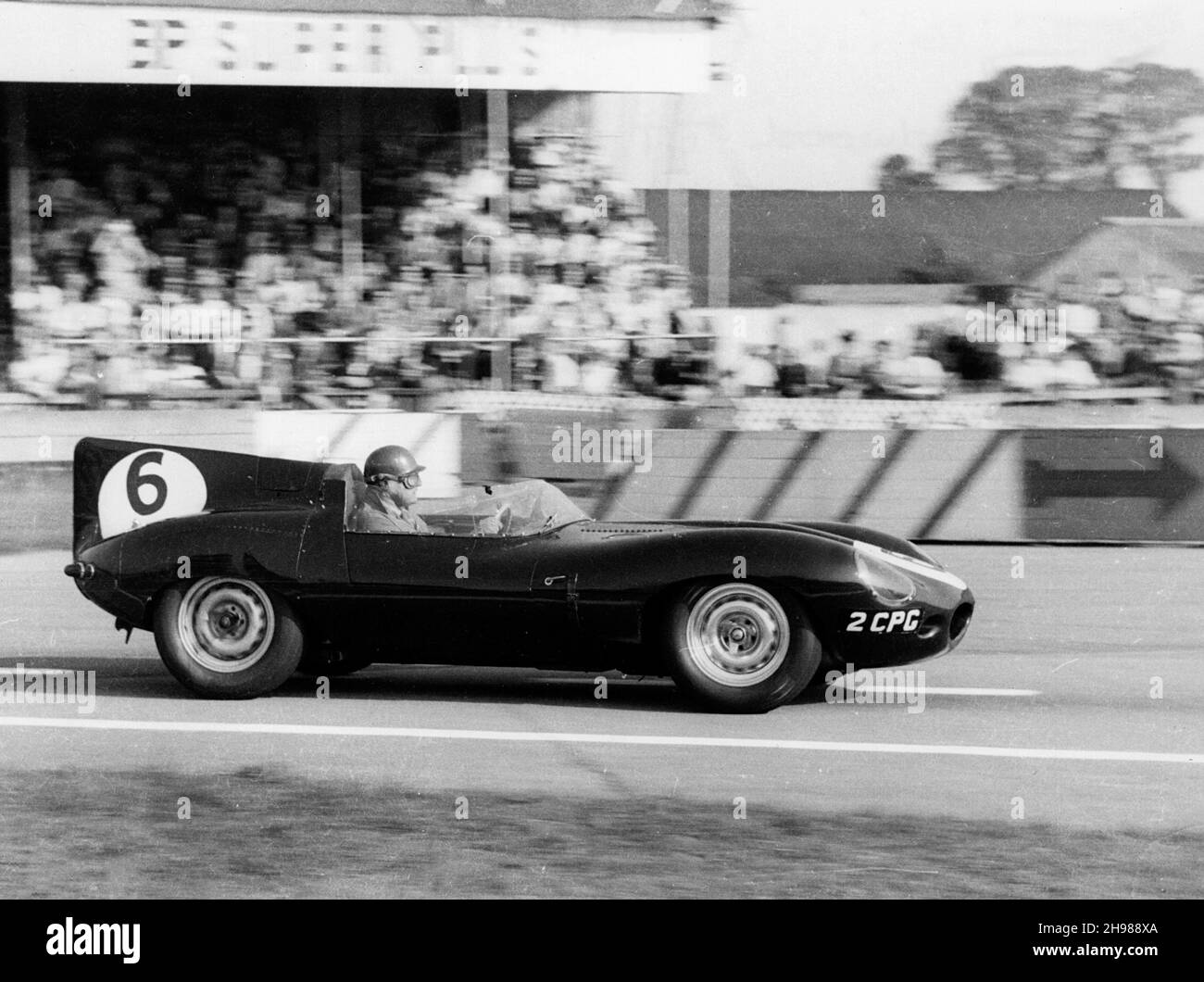 Duncan Hamilton driving a Jaguar D type, RAC Tourist Trophy, Goodwood, Sussex, 1958. Hamilton and his teammate Peter Blond finished in sixth place. Stock Photo
