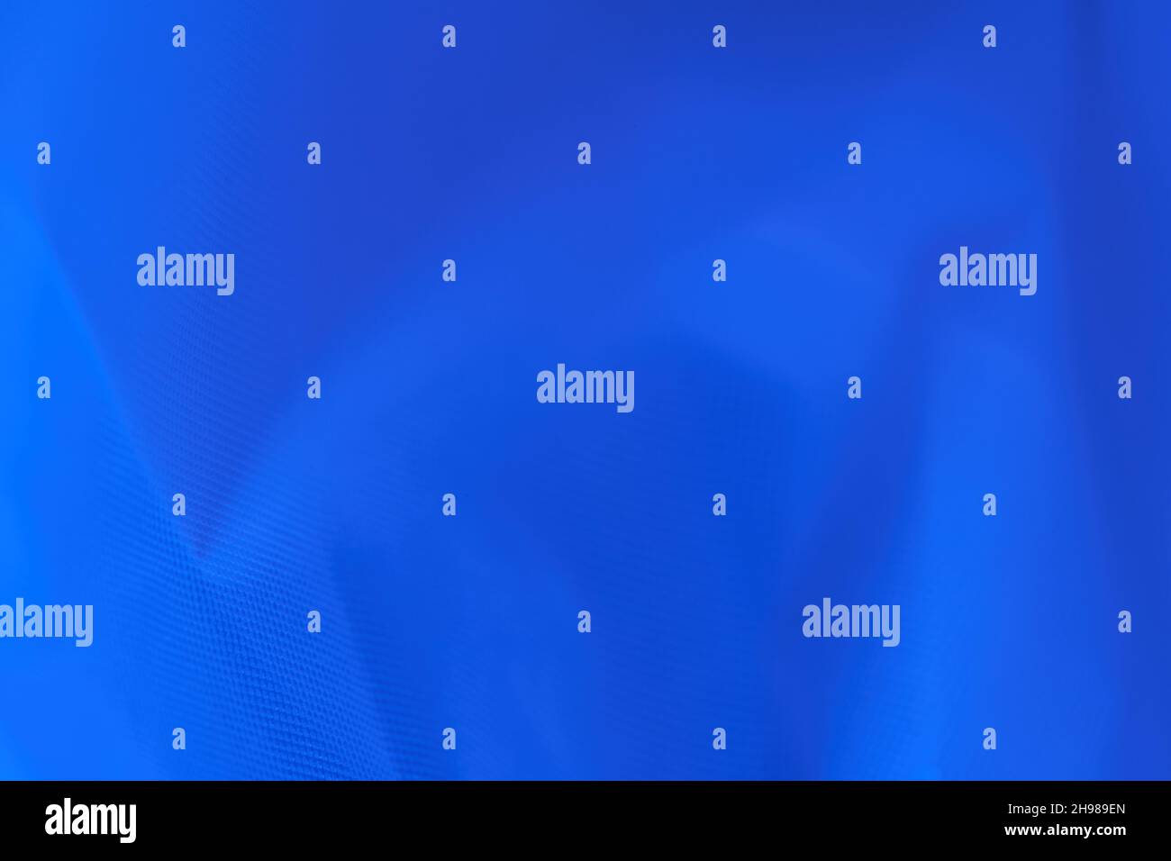 Blue textile fabric. Selective focus. Top view. Stock Photo
