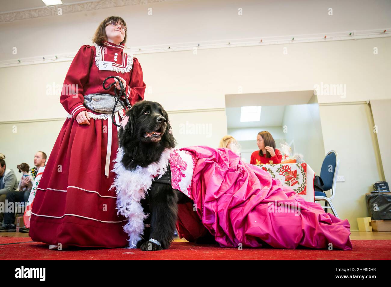 An owner with her dog during the Victorian Christmas themed Furbabies