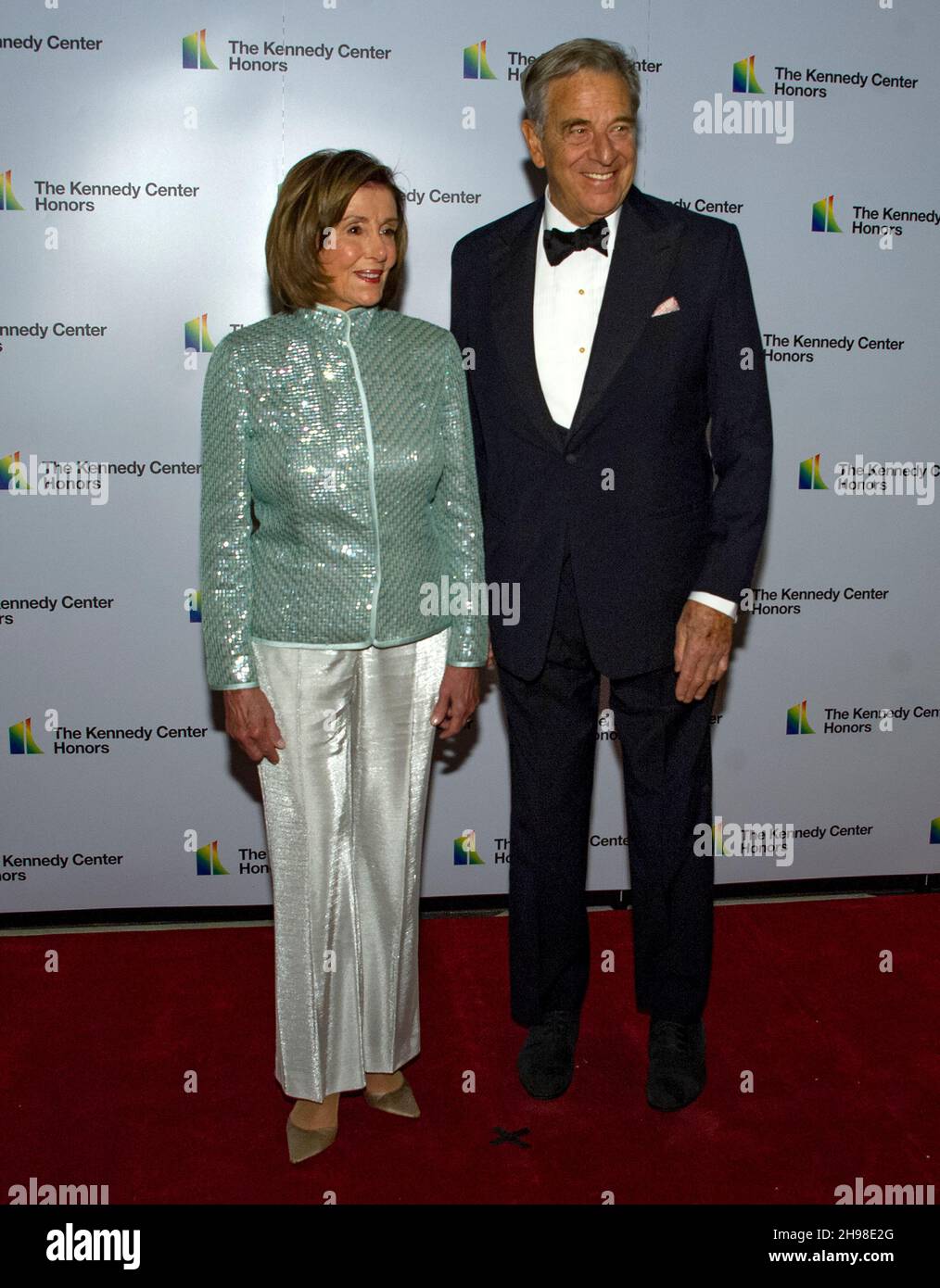 Speaker of the United States House of Representatives Nancy Pelosi (Democrat of California), left, and her husband, Paul Pelosi, arrive for the Medallion Ceremony honoring the recipients of the 44th Annual Kennedy Center Honors at the Library of Congress in Washington, DC on Saturday, December 4, 2021. The 2021 honorees are: operatic bass-baritone Justino Diaz, Motown founder, songwriter, producer and director Berry Gordy, ‘Saturday Night Live' creator Lorne Michaels, legendary stage and screen icon Bette Midler, and singer-songwriter Joni Mitchell.Credit: Ron Sachs/Pool via CNP /MediaPunc Stock Photo
