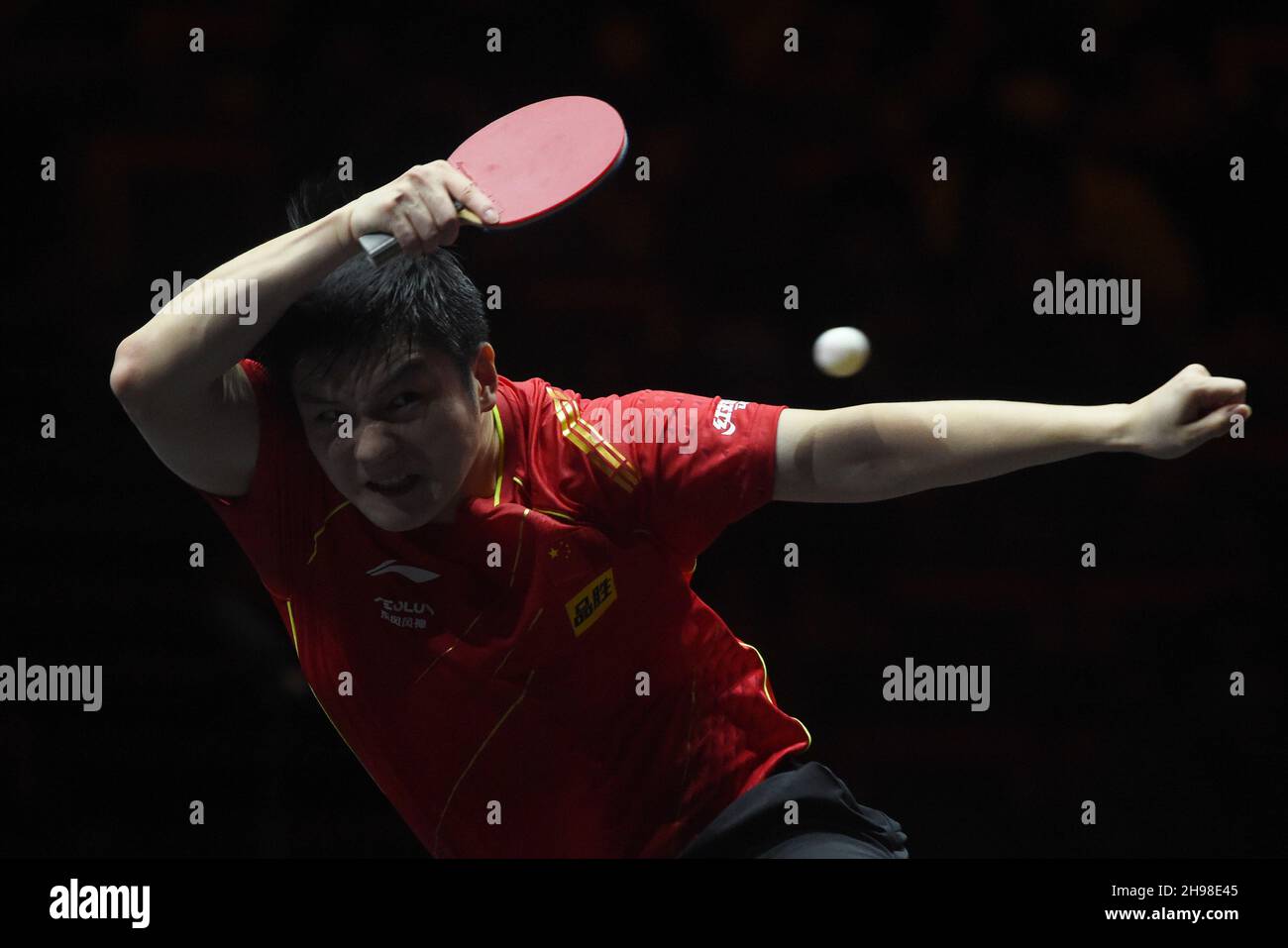 Singapore. 5th Dec, 2021. Fan Zhendong of China hits a return during