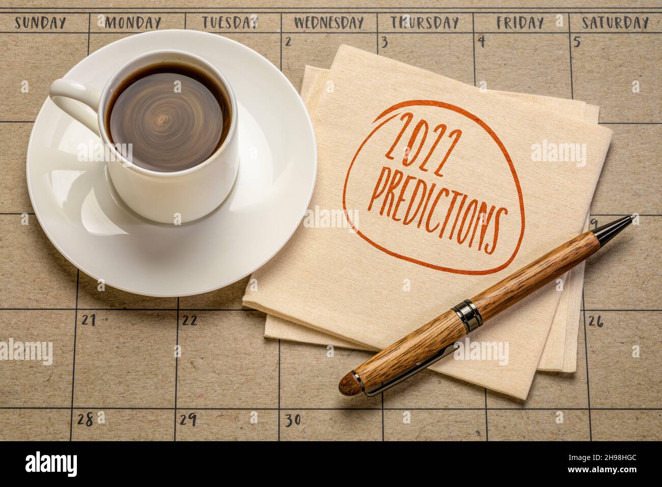 2022 predictions - handwriting on a napkin with a cup of coffee, business and financial trends and expectations in New Year Stock Photo