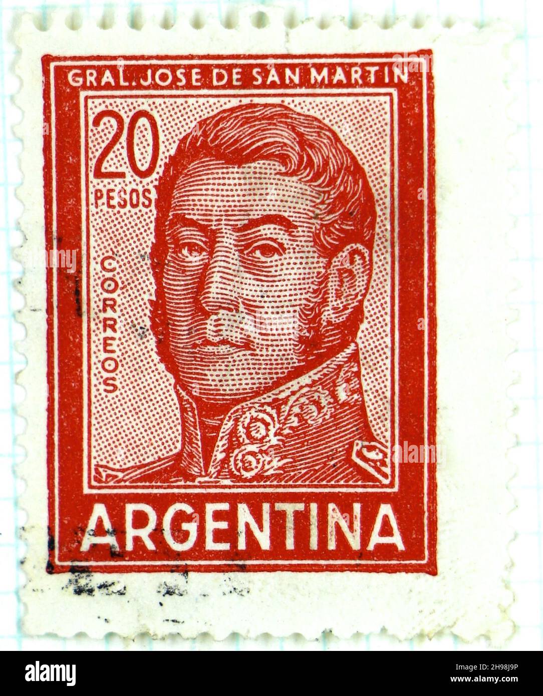 Photo of a red 20 pesos Argentinian postage stamp with General José Francisco de San Martín y Matorras hero for liberating Argentina Chile and Peru Stock Photo