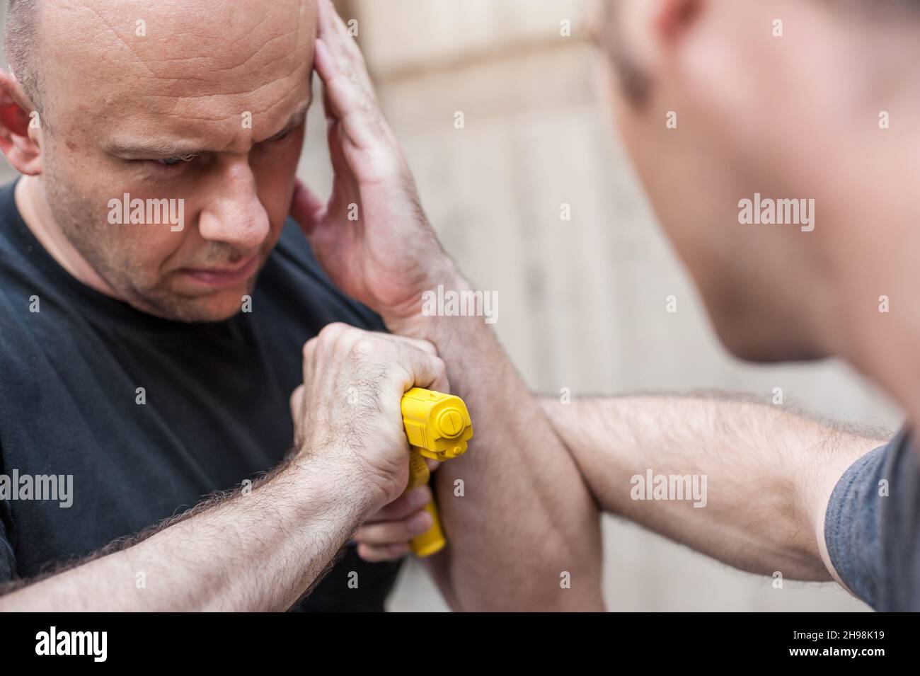 Kapap instructor demonstrates self defense techniques against a gun