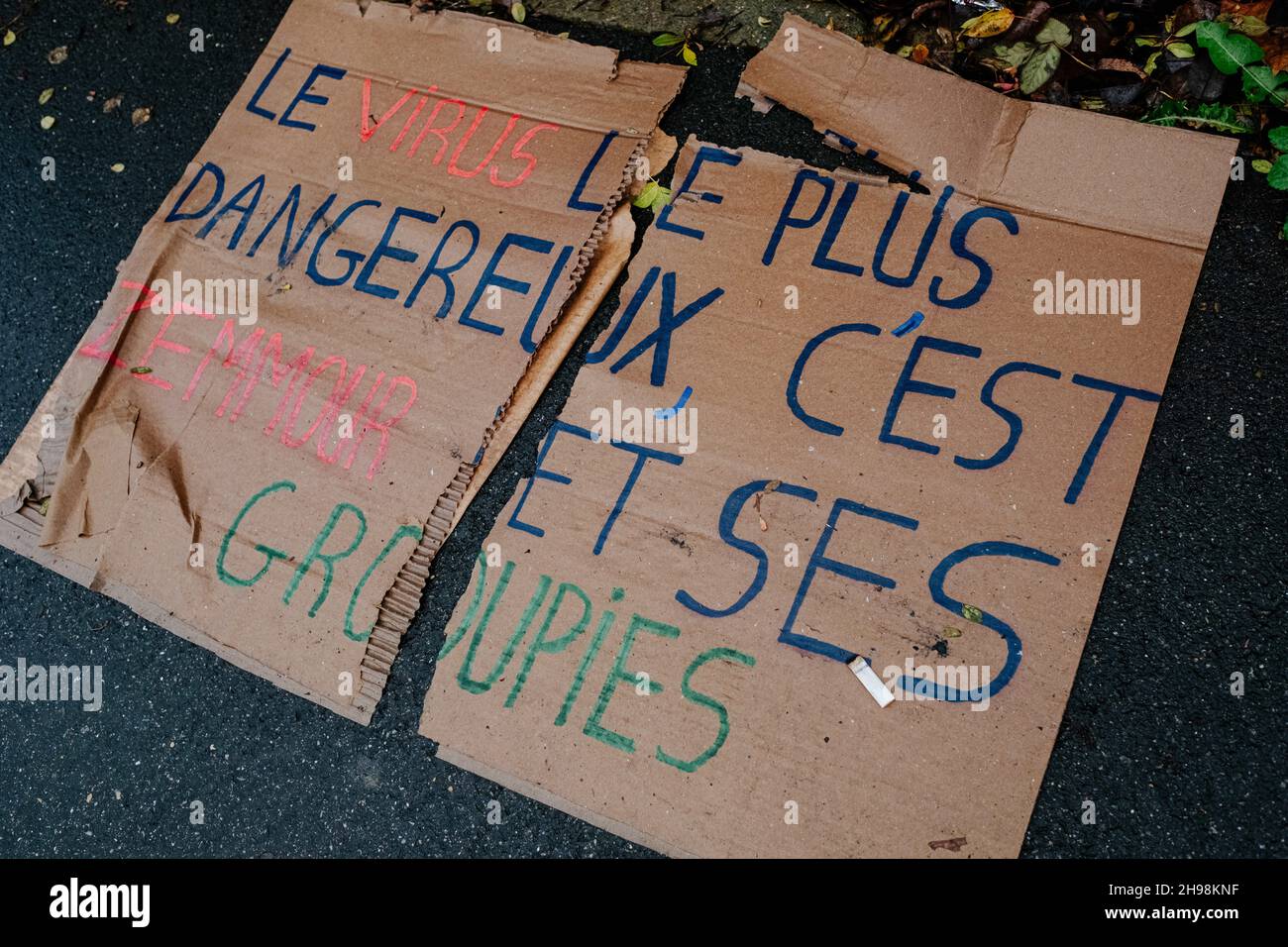 A sign says 'the most dangerous virus is Zemmour and his groupies'. Paris, France, 05 December 2021. Photo by Florent Bardos /ABACAPRESS.COM Stock Photo