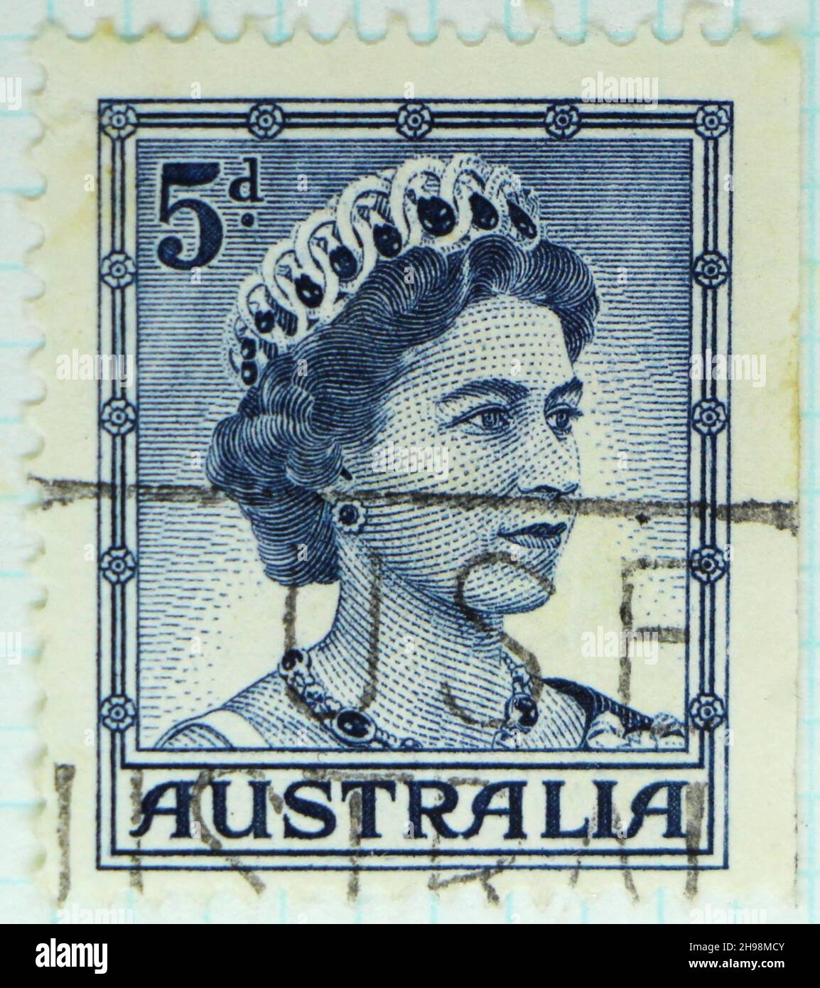 Photo of a blue Australian postage stamp 5d with Queen Elizabeth II in