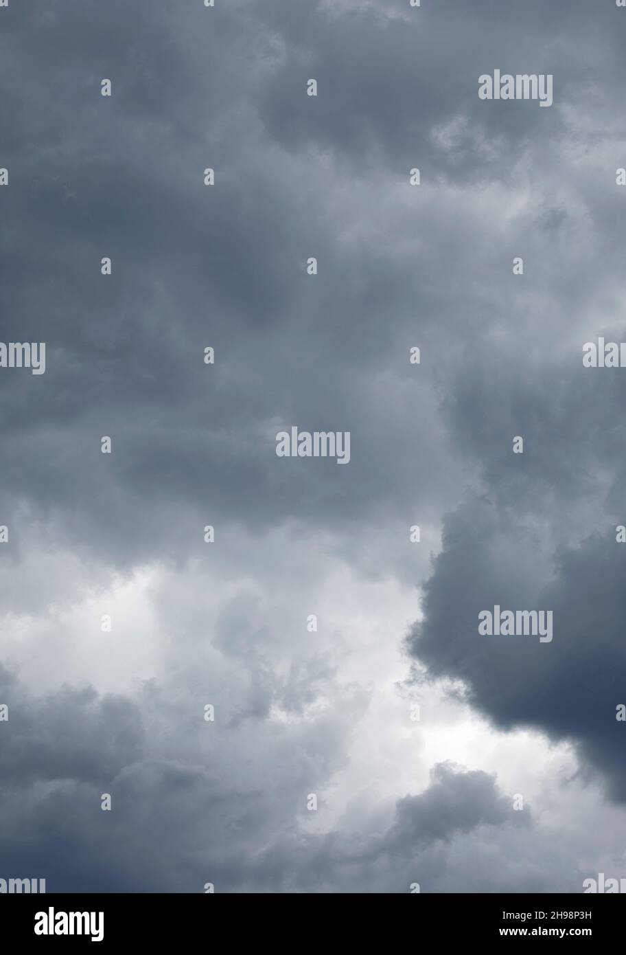 Dark grey clouds at sky Stock Photo