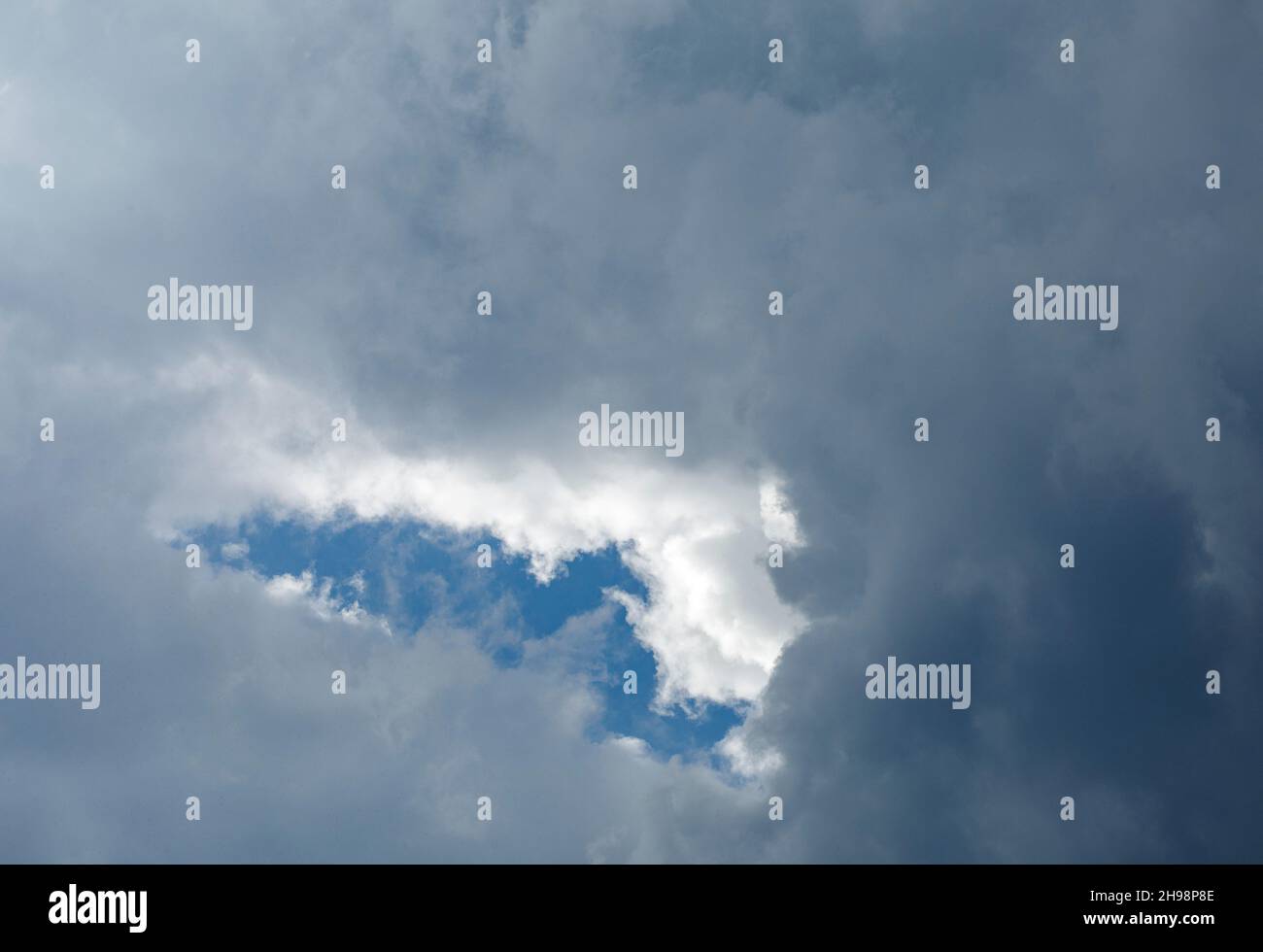 Dark grey clouds at sky Stock Photo
