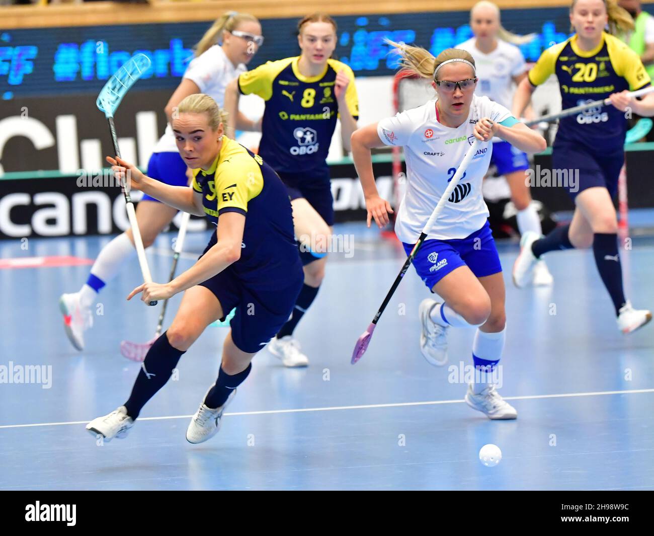 Sweden's Sandra Boric Svard and Finland's Veera Kauppi during the final between Finland and Sweden at the Women's World floorball Championships at IFU Stock Photo