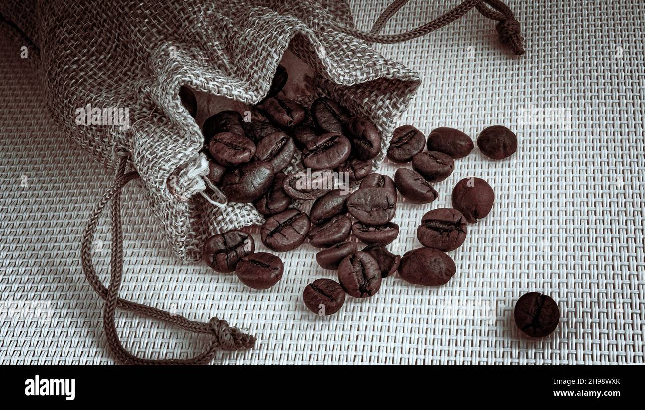 Coffee beans in a sack Stock Photo - Alamy
