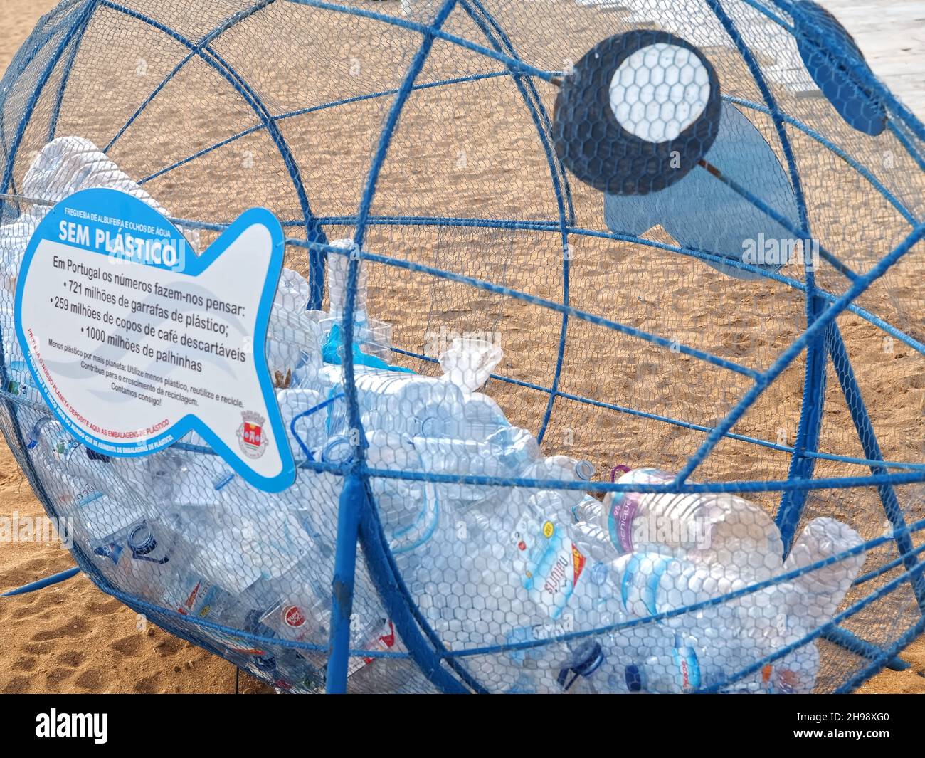 Collection of plastic bottles in a fish sculpture in Albufeira Stock Photo