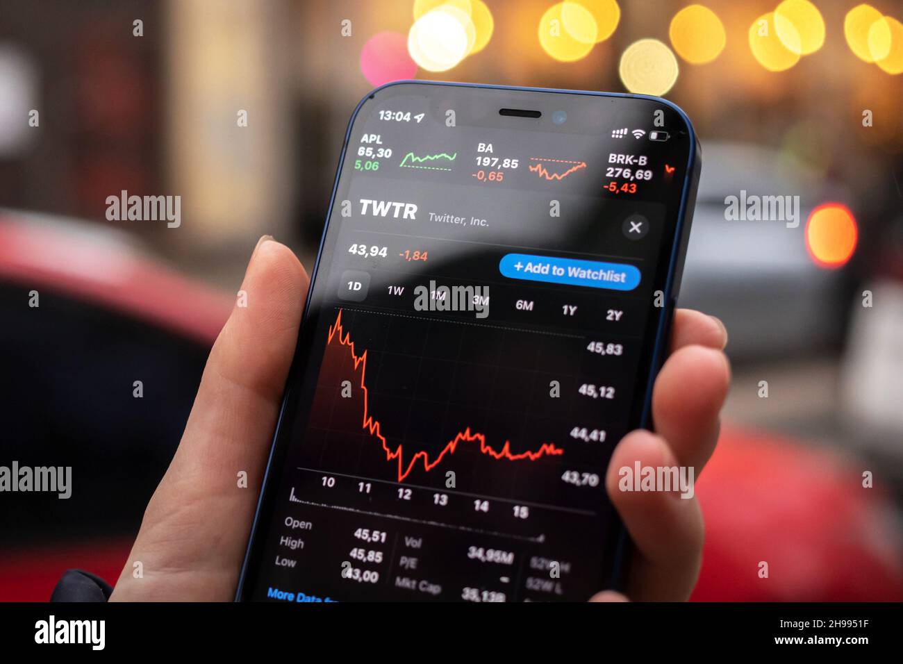 Kharkov, Ukraine - December 1, 2021: Twitter TWTR stock trade. Financial graphs, investment, digital banking concept photo. Smartphone with stock mark Stock Photo