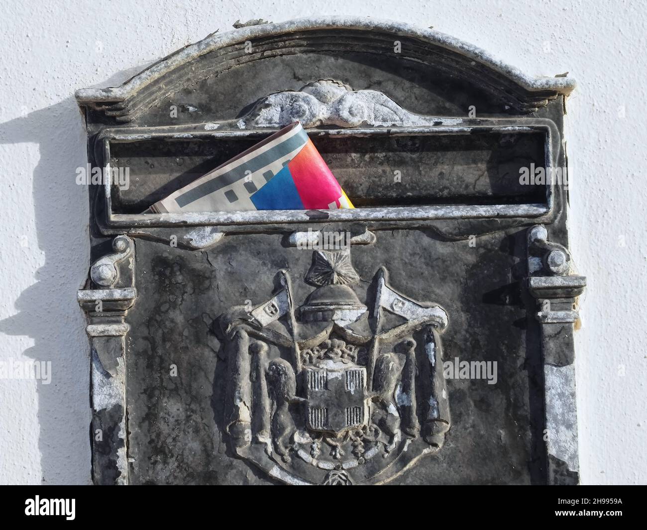 Metal old mail box with a newspaper Stock Photo Alamy