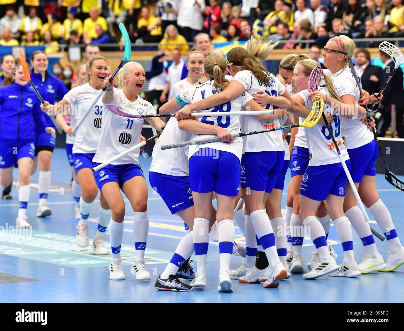 Finland's team celebrates a goal (3-3) during the final between Finland and Sweden at the Women's World floorball Championships at IFU Arena in Uppsal Stock Photo