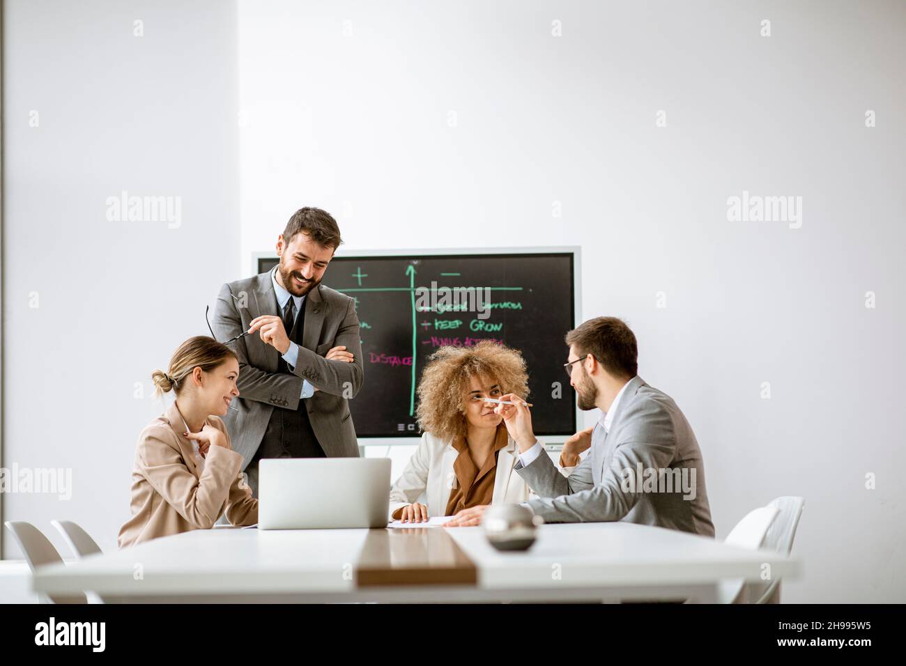 Group of multiethnic young business people working together in the office Stock Photo