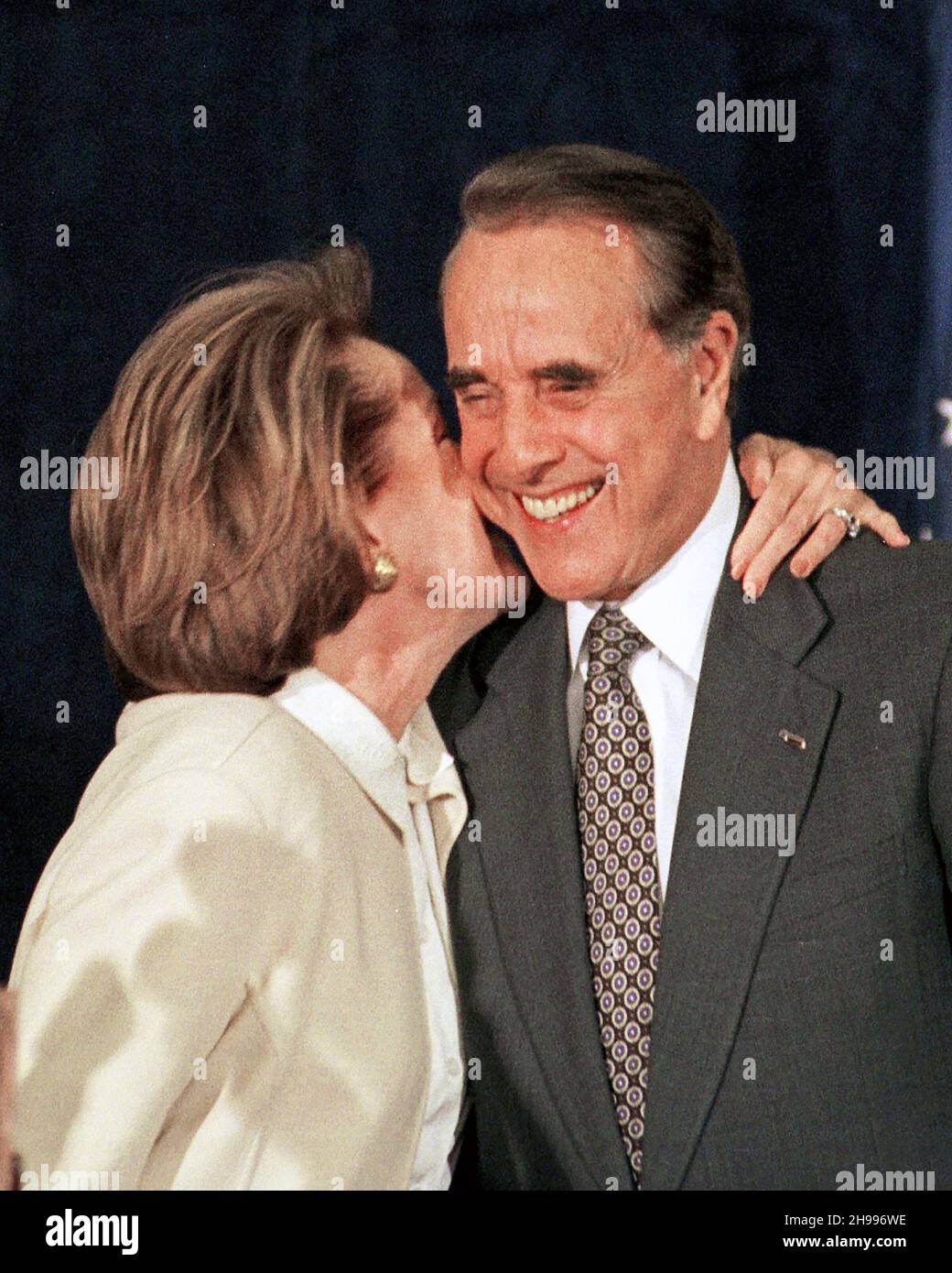 **FILE PHOTO** Bob Dole Has Passed Away at 98. Elizabeth Dole kisses her husband, former United States Senator Bob Dole (Republican of Kansas), the 1996 Republican nominee for US President during her announcement that she was withdrawing from the race for the Republican nomination for President in 2000 on 20 October, 1999. She cited her inability to raise the huge funds necessary to compete with George W. Bush and Steve Forbes. Credit: Ron Sachs/CNP/MediaPunch Stock Photo
