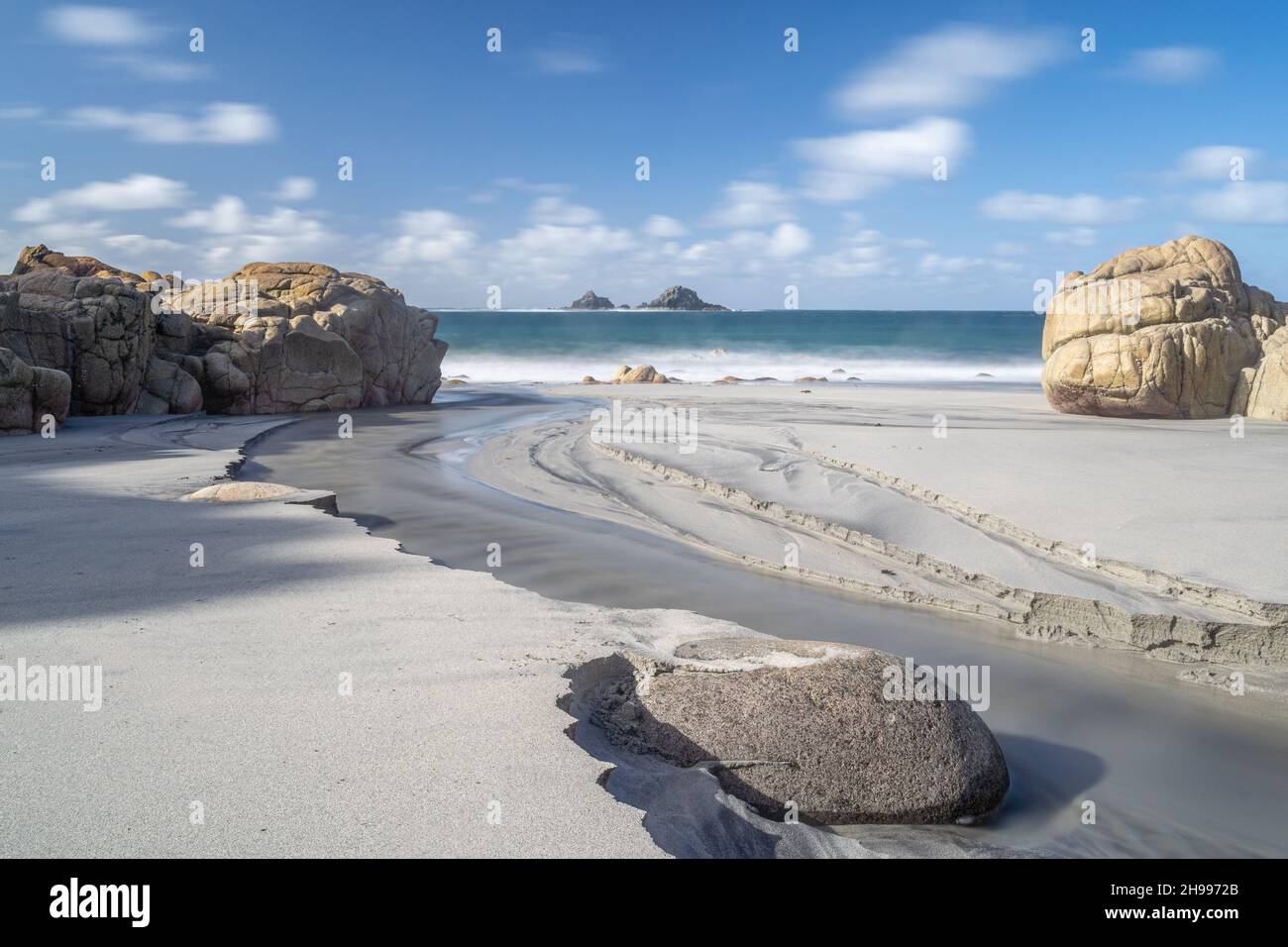 Porth Nanven in Cornwall with it's beautiful beach and smooth round boulders Stock Photo