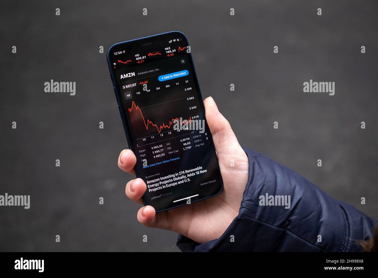 Kharkov, Ukraine - December 1, 2021: Amazon AMZN stock trade. Financial graphs, investment, digital banking concept photo. Smartphone with stock marke Stock Photo