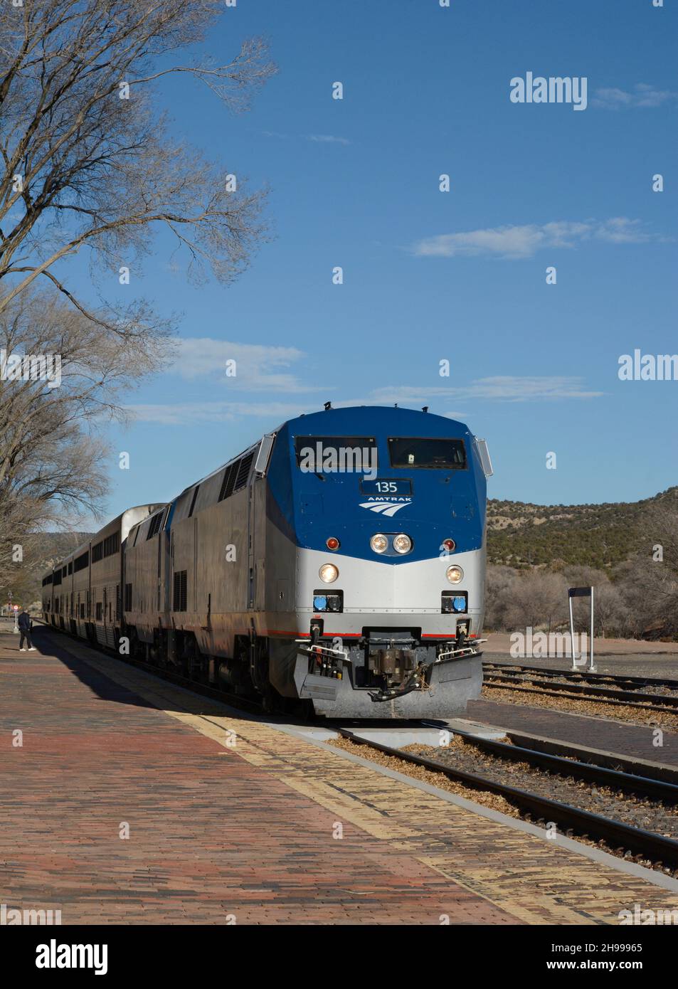 An Amtrak train, the Southwest Chief, arrives in Lamy, New Mexico, en route from Chicago to Los Angeles. Stock Photo