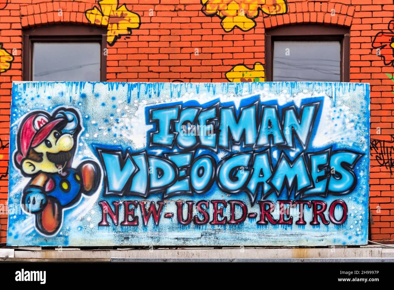 Iceman video games store in Kensington market, Toronto with mural