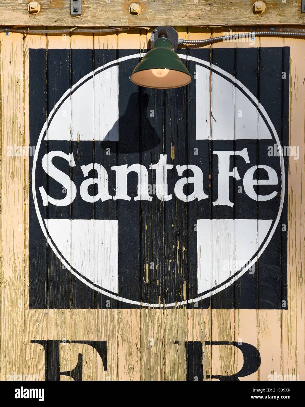 The historic logo for the Atchison, Topeka and Santa Fe Railway painted on a vintage boxcar at historic Lamy Station in Lamy, New Mexico. Stock Photo