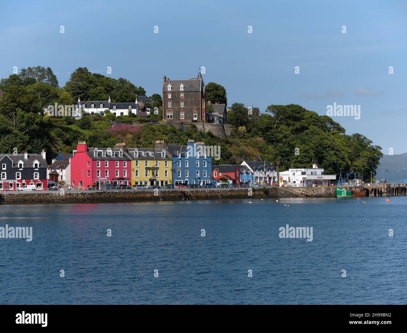 The summer harbour waterfront of Tobermory on the Isle of Mull in the Inner Hebrides, Argyll & Bute Scotland UK - summertime coast town tourism Stock Photo