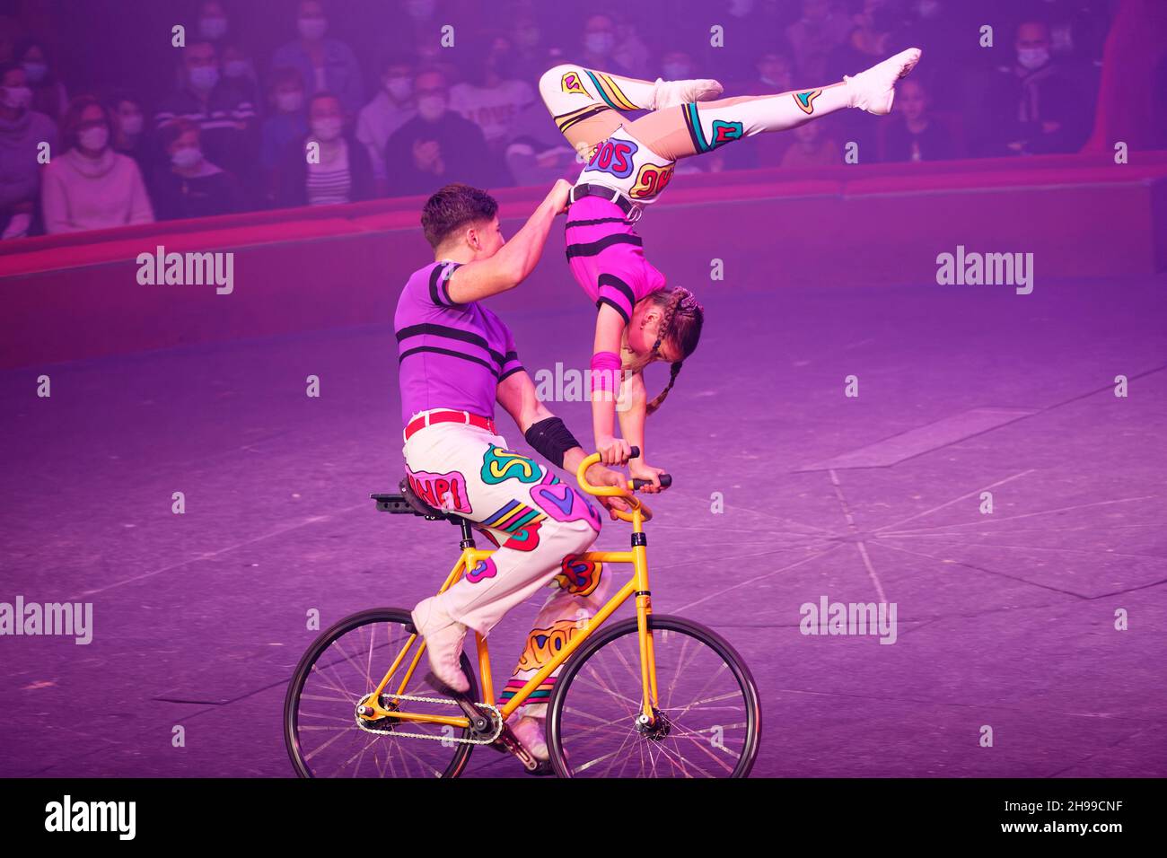 Paris, France. 4th Dec, 2021. Alexis, Eros & the LYD duo on their acrobatic bicycles perform during Cirque Arlette Gruss's EXCENTRIK show. Stock Photo