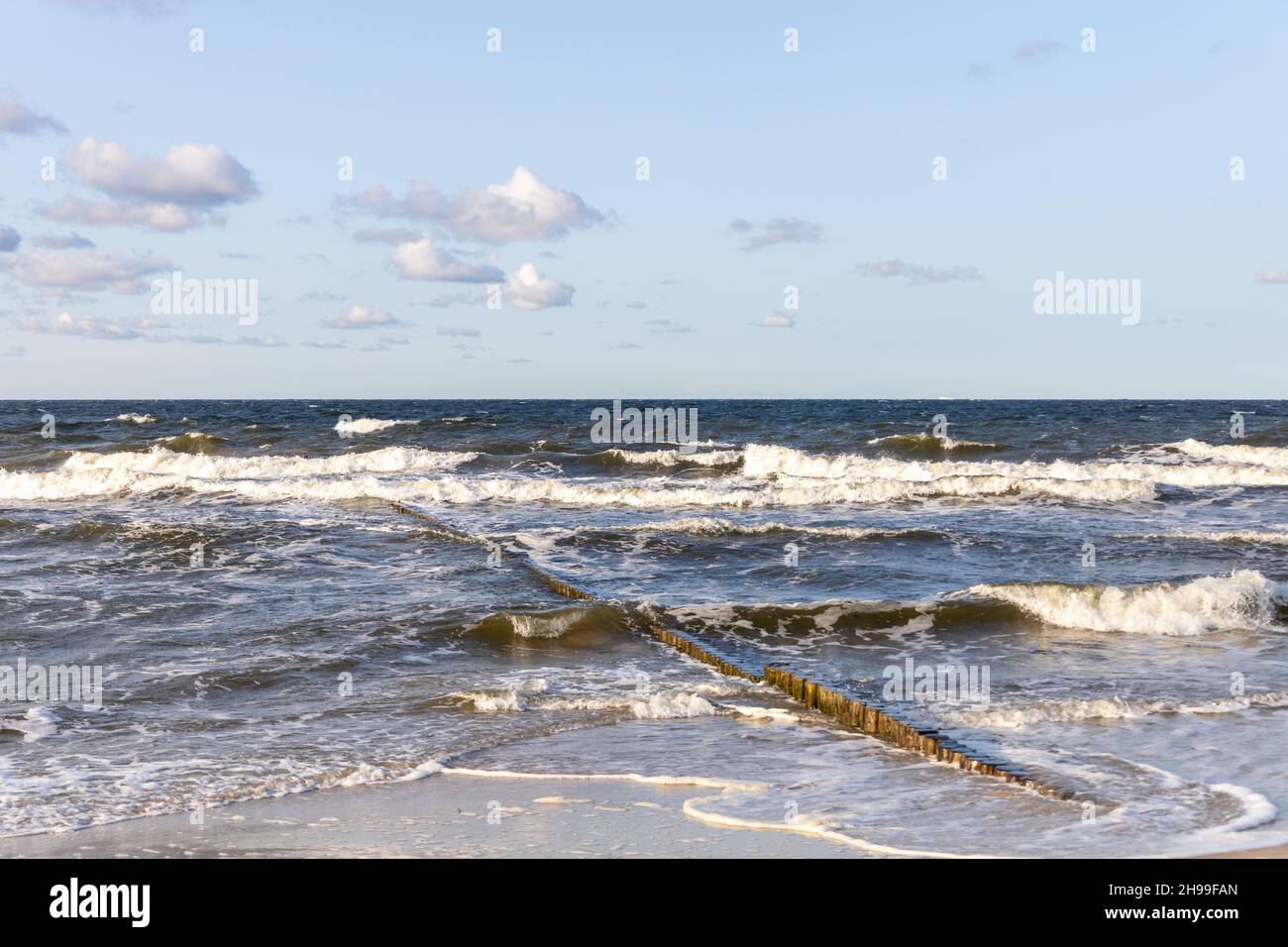 Waves on the beach of Zempin on the island of Usedom on a beautiful day in summer Stock Photo