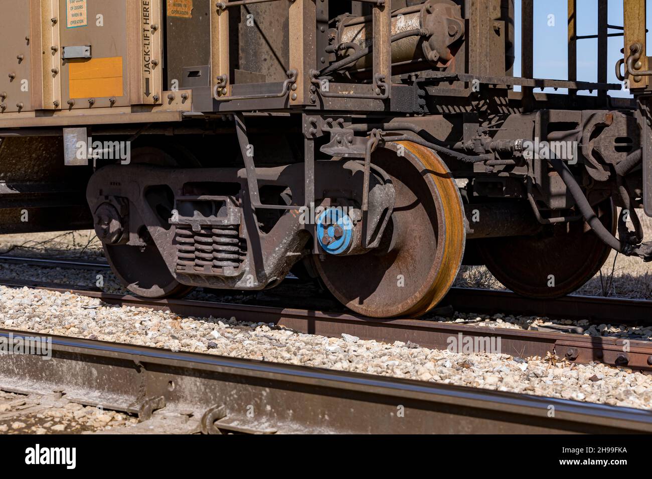 Freight train cars on railroad tracks. Supply chain, rail transportation and shipping concept. Stock Photo