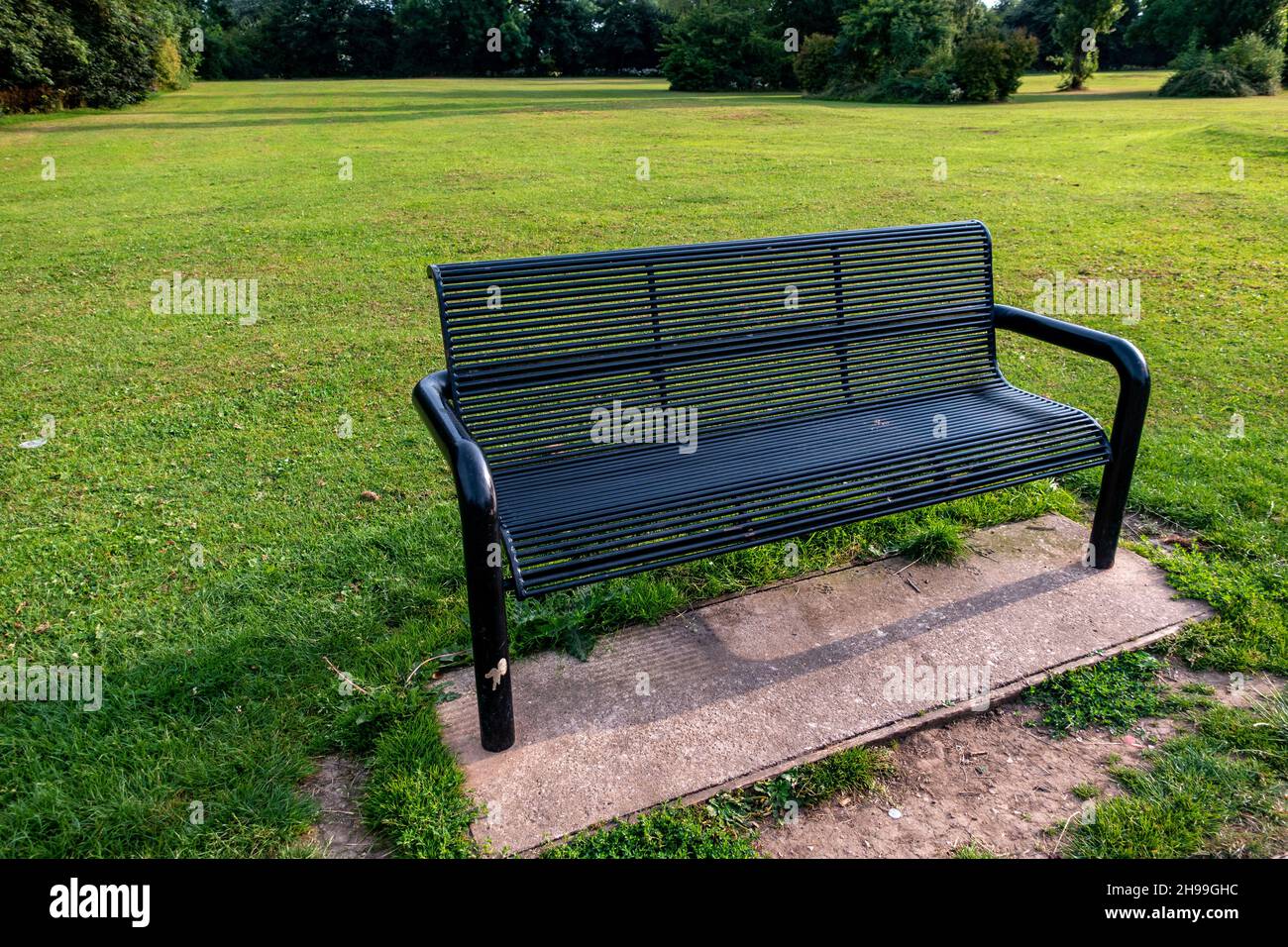 Metal Park bench in Greenlands Park, Dinnington, South Yorkshire Stock Photo
