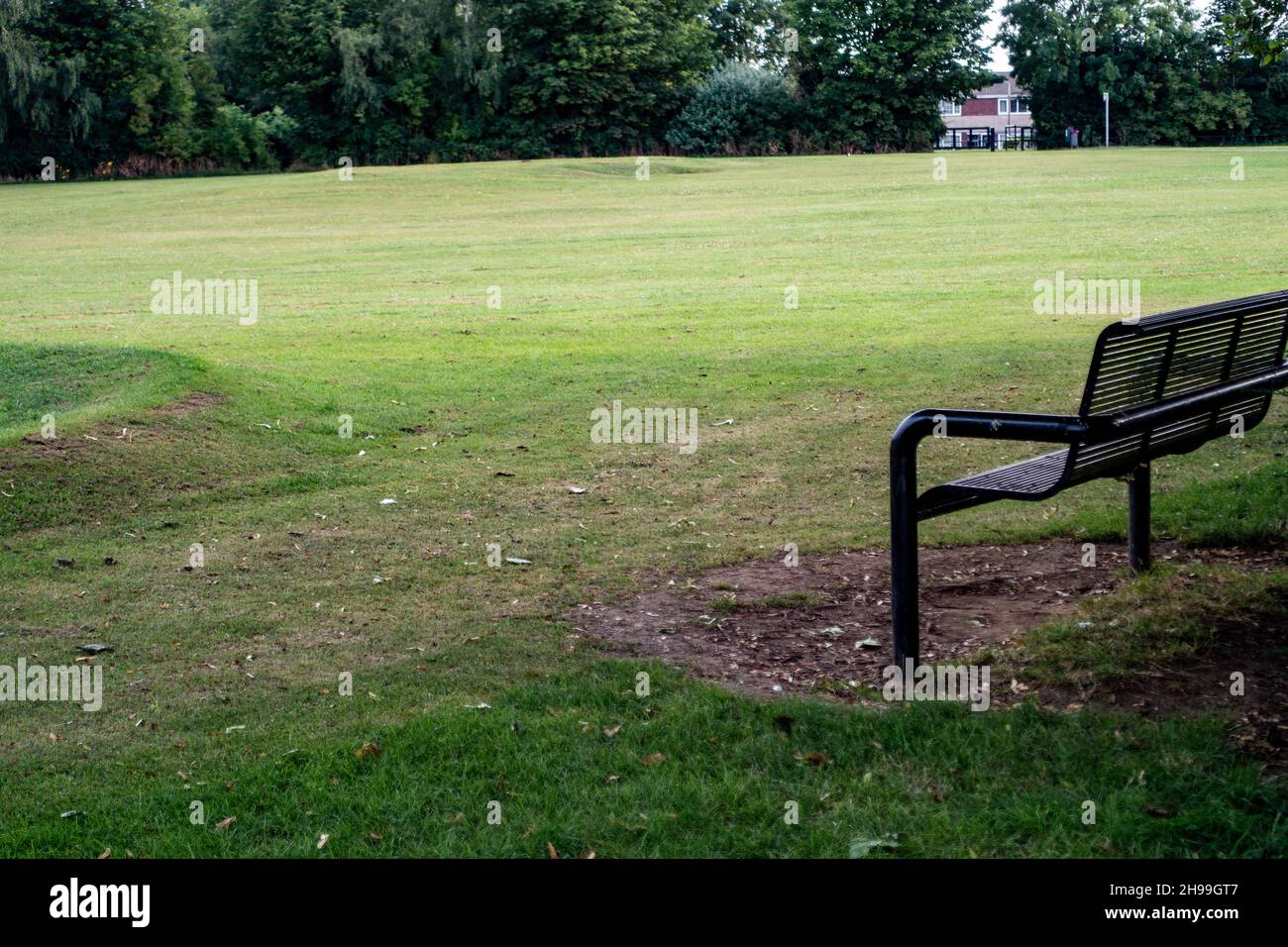 Metal Park bench from the rear in Greenlands Park, Dinnington, South Yorkshire Stock Photo