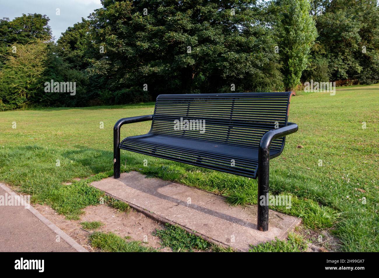 Metal Park bench in Greenlands Park, Dinnington, South Yorkshire Stock Photo