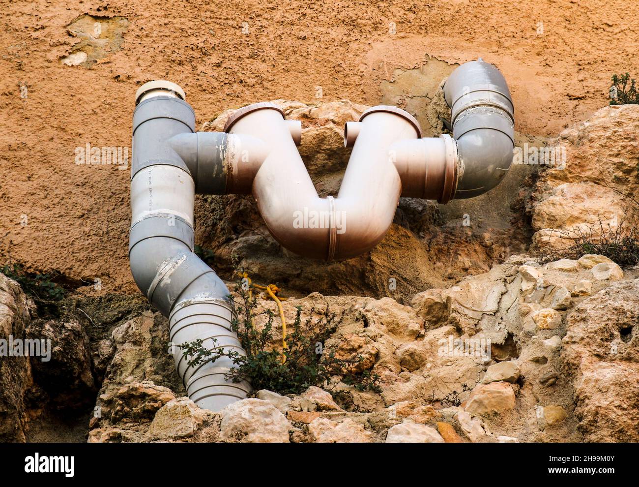 Pvc drain pipes on the wall of a mountain in Spain Stock Photo Alamy