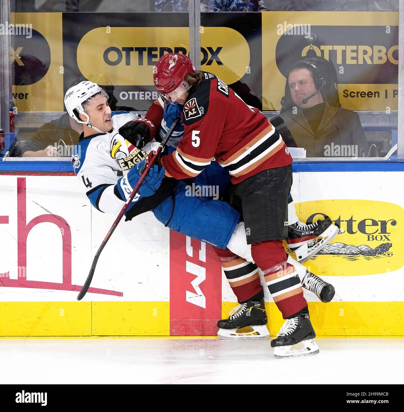 Loveland, Colorado, USA. 4th Dec, 2021. Roadrunners D CAMERON CROTTY, right, up ends an Eagles Player Saturday night at the Budweiser Events Center. The Eagles beat the Roadrunners 4-0. (Credit Image: © Hector Acevedo/ZUMA Press Wire) Stock Photo