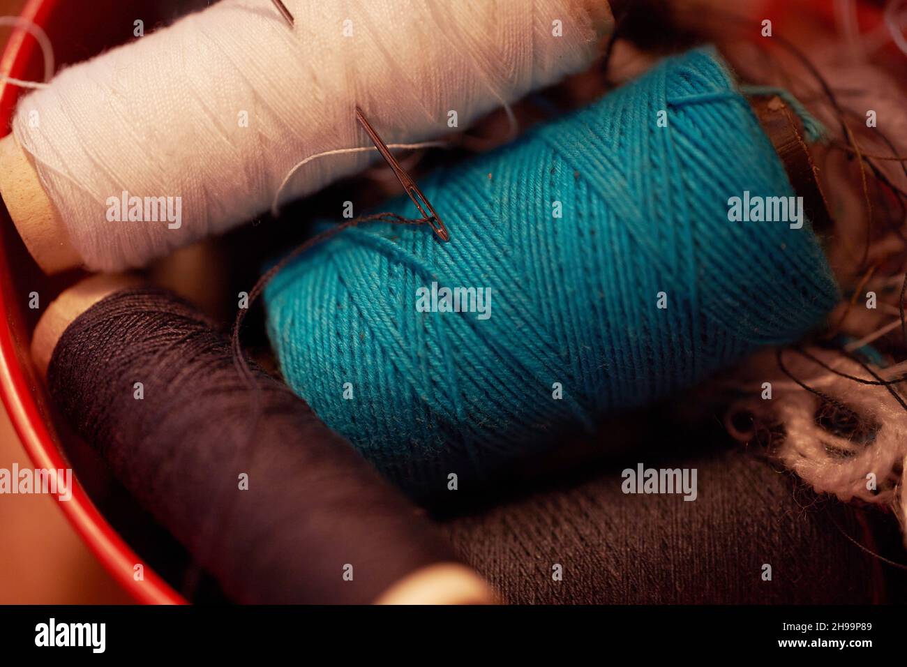 Threads for sewing with a needle. Macro effect Stock Photo
