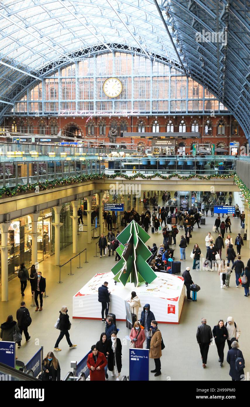 The 2021 Christmas tree in St Pancras train station, this year sponsored by London Zoo, in north