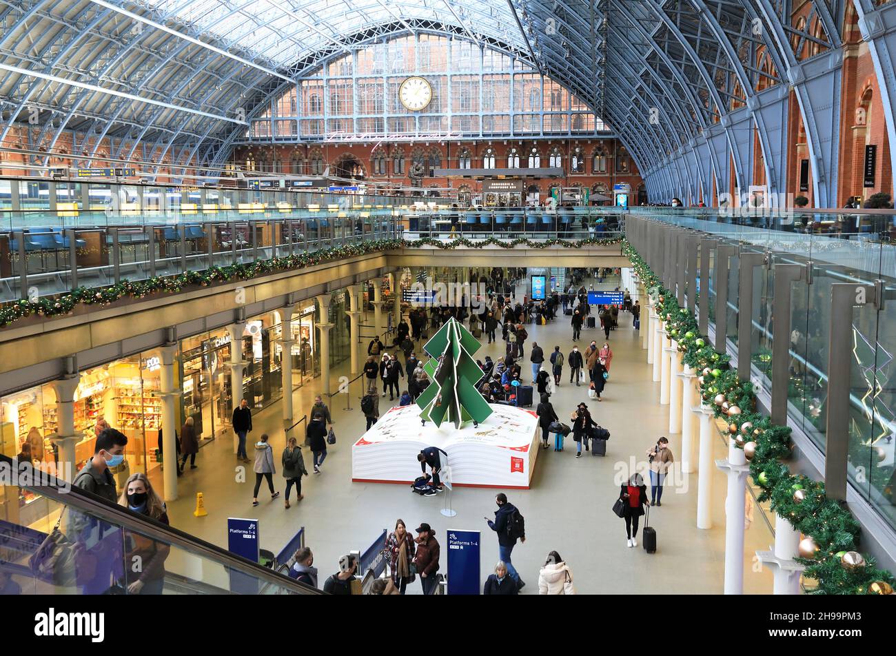 The 2021 Christmas tree in St Pancras train station, this year sponsored by London Zoo, in north