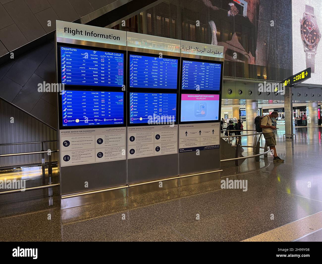 Flight Information board at Hamad international airport Stock Photo