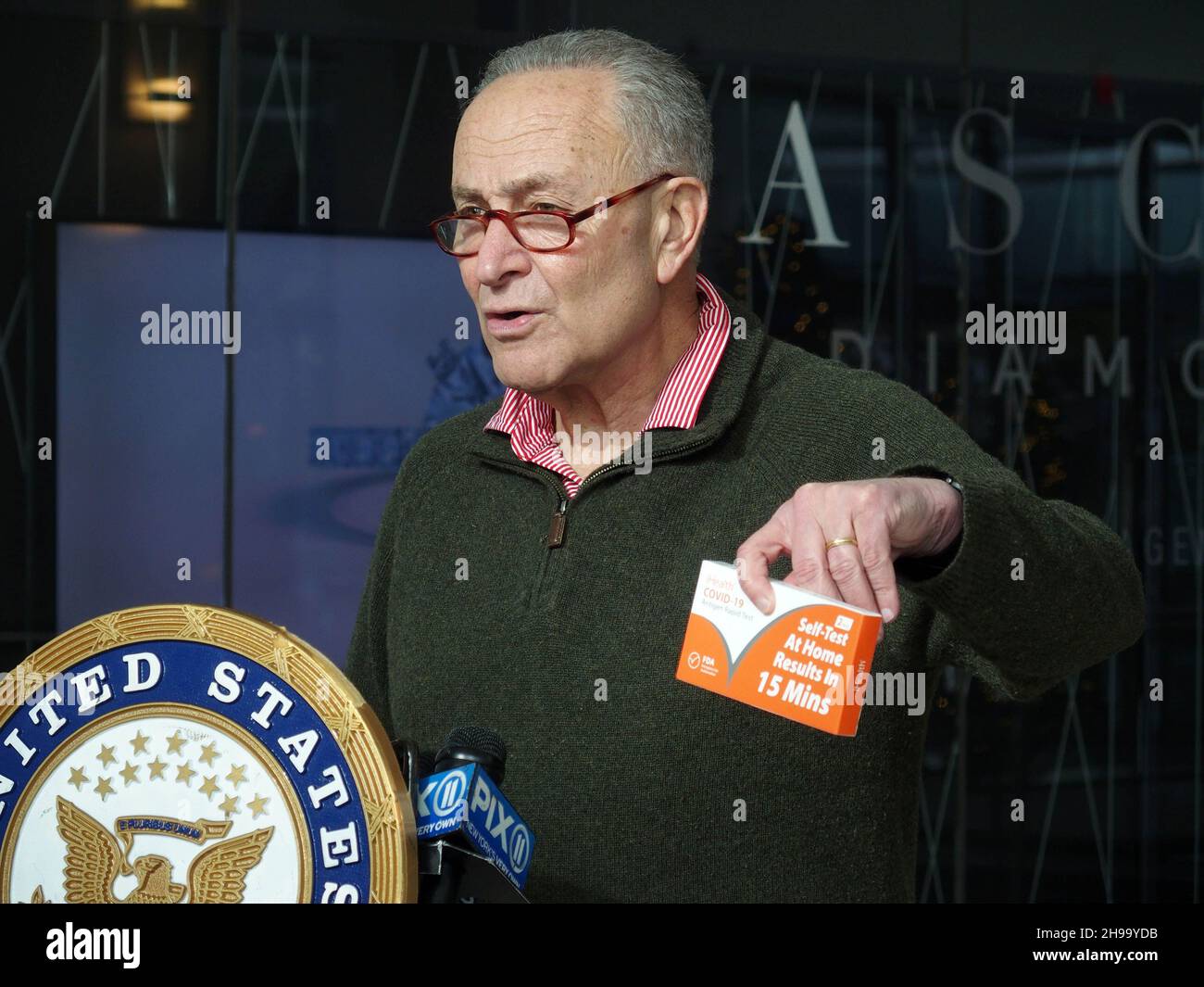 December 5, 2021, New York, New York, USA: New York Senator Charles ''Chuck'' Schumer press conference on  COVIDâ€™s Omicron variant spreading, U.S. Senator Charles Schumer said the key to controlling it centers around the at-home tests now for sale across the country. Schumer praised President Biden for prepping a plan to be released on January 15th that will have insurance companies reimburse for the cost of an at-home testâ€”but, he said, while we wait, he wants a surge of rapid at-home tests sent to New York community health centers and their mobile sites, across the City and Long Island. Stock Photo