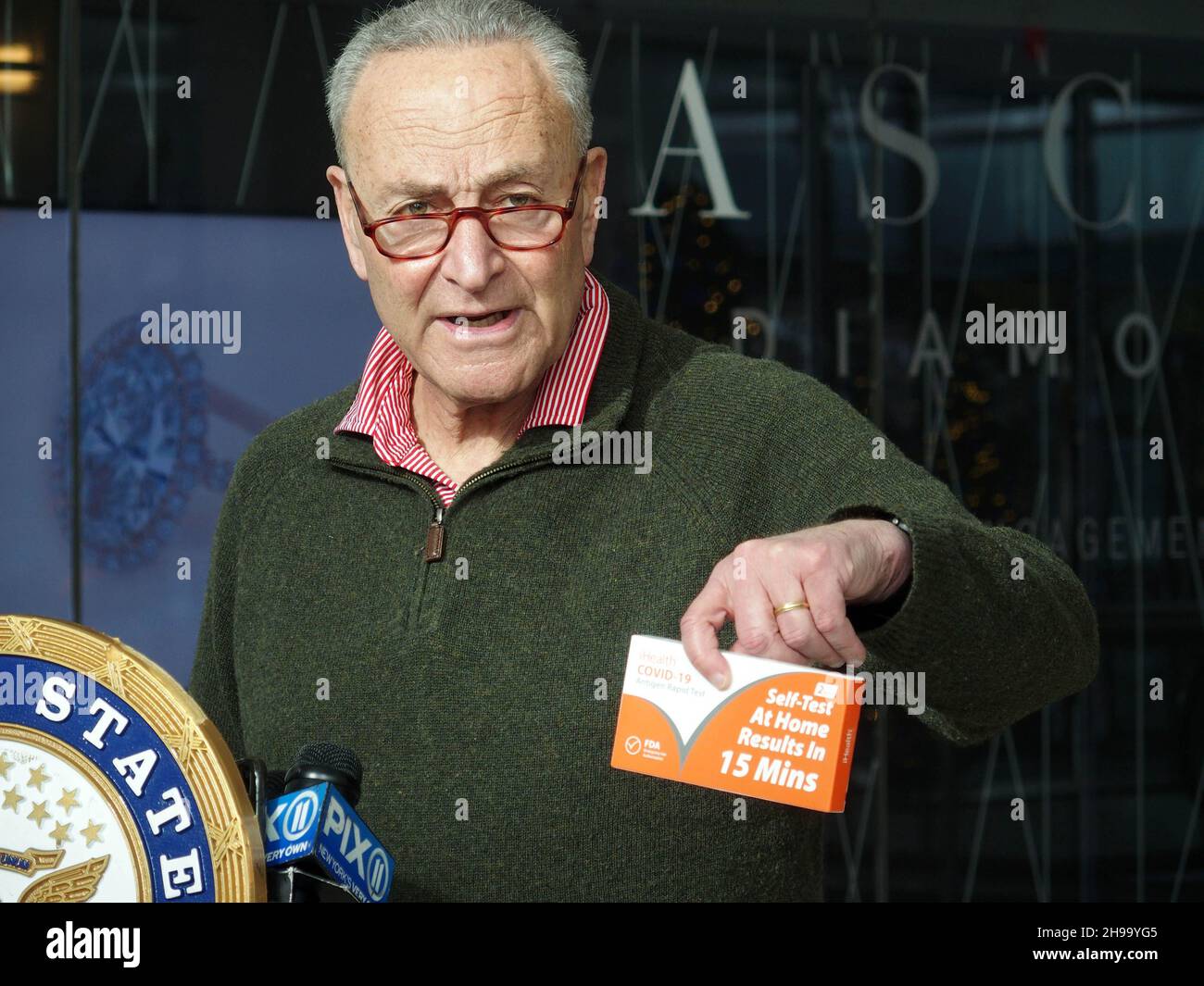 December 5, 2021, New York, New York, USA: New York Senator Charles ''Chuck'' Schumer press conference on  COVIDâ€™s Omicron variant spreading, U.S. Senator Charles Schumer said the key to controlling it centers around the at-home tests now for sale across the country. Schumer praised President Biden for prepping a plan to be released on January 15th that will have insurance companies reimburse for the cost of an at-home testâ€”but, he said, while we wait, he wants a surge of rapid at-home tests sent to New York community health centers and their mobile sites, across the City and Long Island. Stock Photo