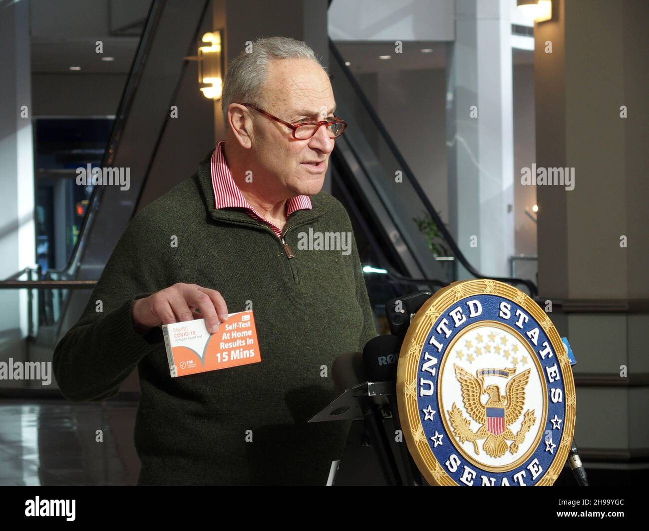 December 5, 2021, New York, New York, USA: New York Senator Charles ''Chuck'' Schumer press conference on  COVIDâ€™s Omicron variant spreading, U.S. Senator Charles Schumer said the key to controlling it centers around the at-home tests now for sale across the country. Schumer praised President Biden for prepping a plan to be released on January 15th that will have insurance companies reimburse for the cost of an at-home testâ€”but, he said, while we wait, he wants a surge of rapid at-home tests sent to New York community health centers and their mobile sites, across the City and Long Island. Stock Photo