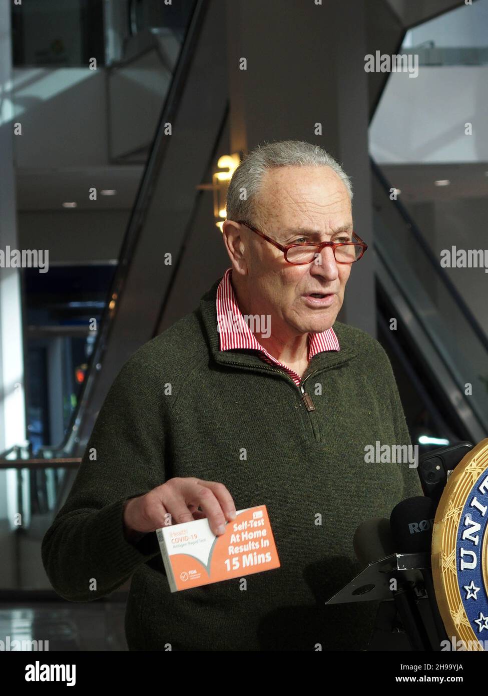December 5, 2021, New York, New York, USA: New York Senator Charles ''Chuck'' Schumer press conference on  COVIDâ€™s Omicron variant spreading, U.S. Senator Charles Schumer said the key to controlling it centers around the at-home tests now for sale across the country. Schumer praised President Biden for prepping a plan to be released on January 15th that will have insurance companies reimburse for the cost of an at-home testâ€”but, he said, while we wait, he wants a surge of rapid at-home tests sent to New York community health centers and their mobile sites, across the City and Long Island. Stock Photo