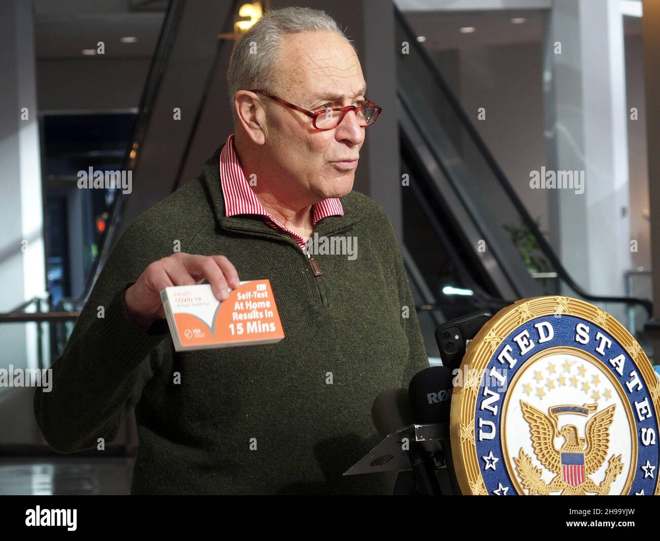 December 5, 2021, New York, New York, USA: New York Senator Charles ''Chuck'' Schumer press conference on  COVIDâ€™s Omicron variant spreading, U.S. Senator Charles Schumer said the key to controlling it centers around the at-home tests now for sale across the country. Schumer praised President Biden for prepping a plan to be released on January 15th that will have insurance companies reimburse for the cost of an at-home testâ€”but, he said, while we wait, he wants a surge of rapid at-home tests sent to New York community health centers and their mobile sites, across the City and Long Island. Stock Photo