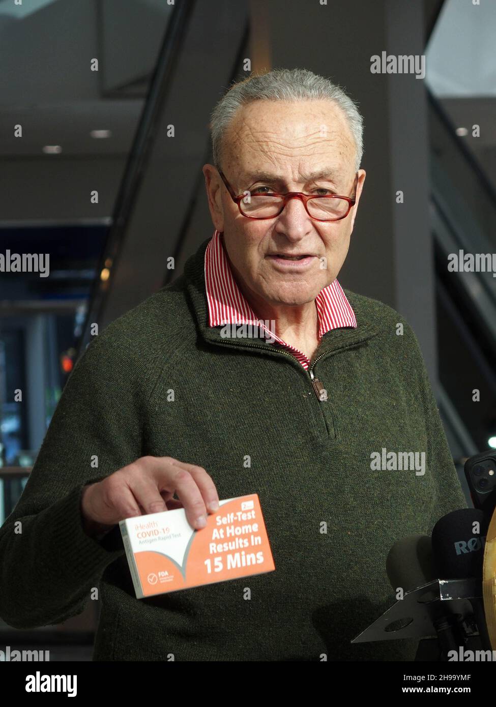 December 5, 2021, New York, New York, USA: New York Senator Charles ''Chuck'' Schumer press conference on  COVIDâ€™s Omicron variant spreading, U.S. Senator Charles Schumer said the key to controlling it centers around the at-home tests now for sale across the country. Schumer praised President Biden for prepping a plan to be released on January 15th that will have insurance companies reimburse for the cost of an at-home testâ€”but, he said, while we wait, he wants a surge of rapid at-home tests sent to New York community health centers and their mobile sites, across the City and Long Island. Stock Photo